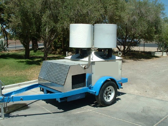 Twin Hollywood searchlights mounted on a trailer ready for an event